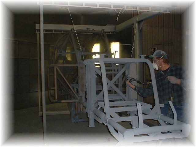 Primed monster truck frame at the W. Kendall shop
